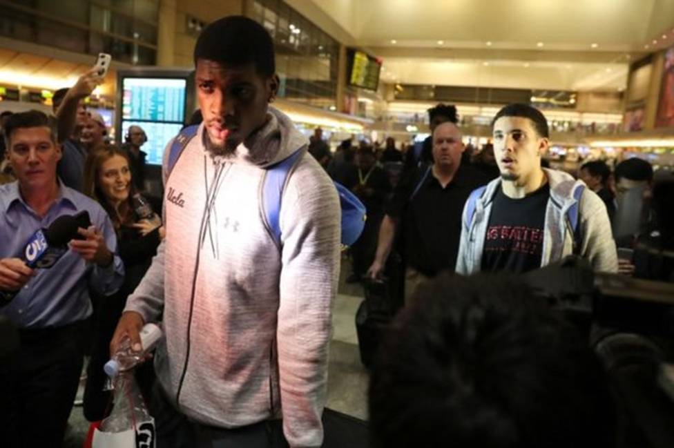 The players were mobbed by reporters upon their return to LAX airport